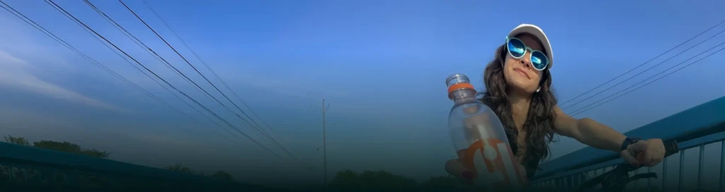 Active outdoor lifestyle in Florida with naturally alkaline spring water bottle from Crystal River limestone aquifer